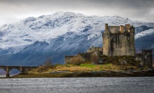 Eilean Donan Castle and the snowy mountains of the western Highlands of Scotland