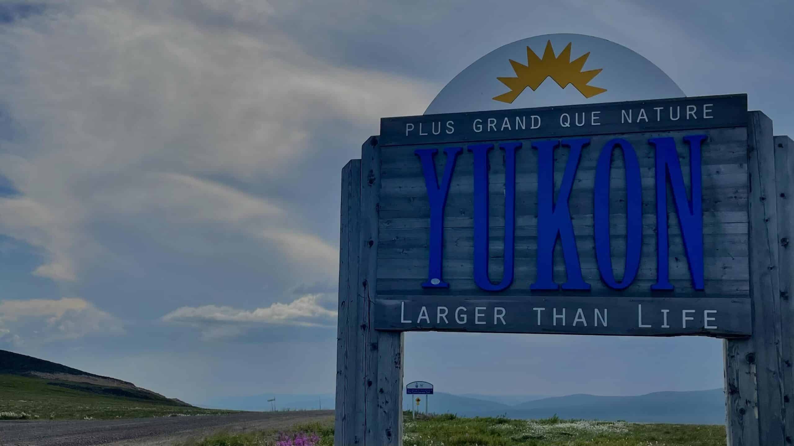 A photo of the Yukon sign taken on the Dempster Highway